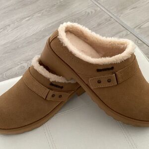 BearPaw Tan Suede Mules with Cream Lining faux fur. Gently worn